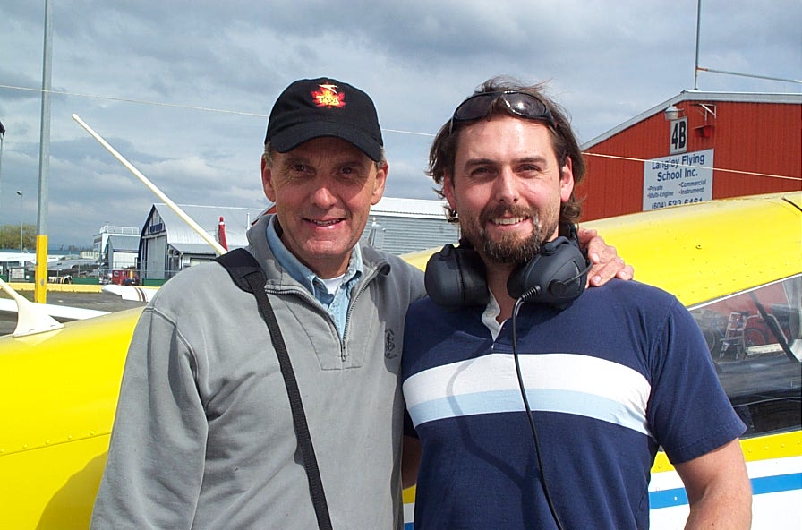 Josh Olson and his Father after Josh's First Solo Flight.  Langley Flying School.